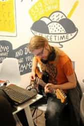 man playing the guitar at global game jam 2020